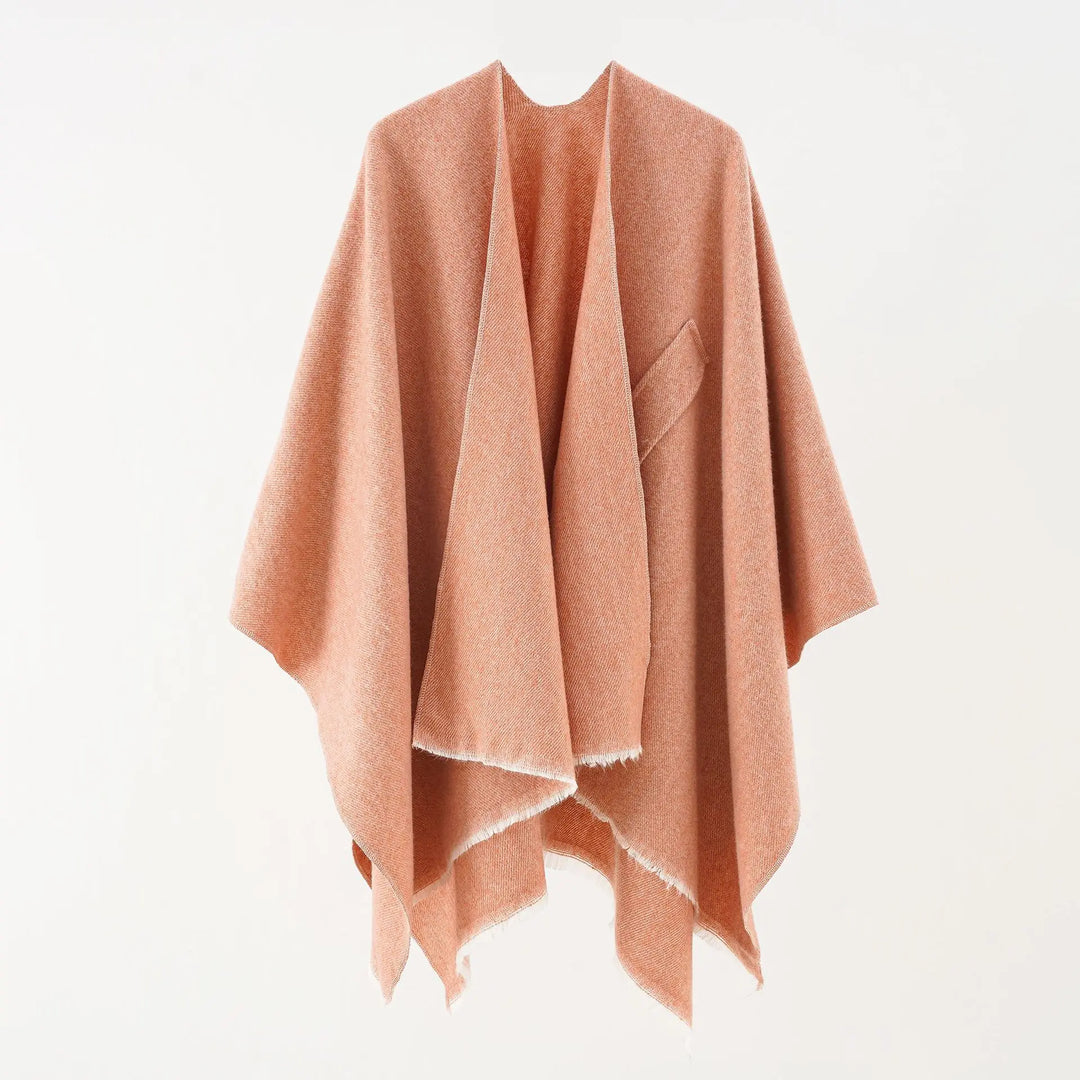 Damesponcho met kasjmier uitstraling, comfortabel en warm in retro stijl.