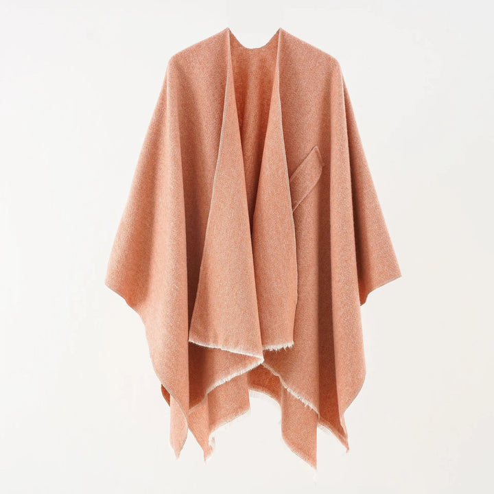 Damesponcho met kasjmier uitstraling, comfortabel en warm in retro stijl.