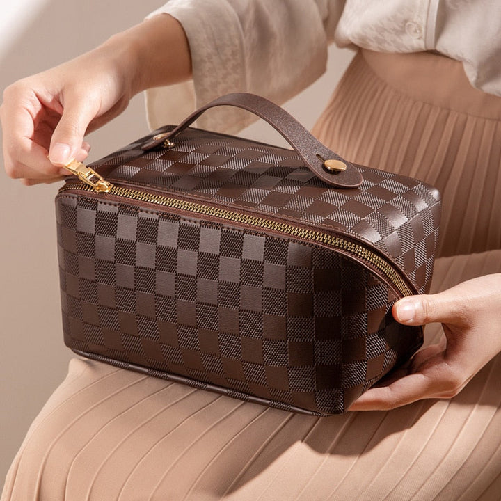 Moderne dames toilettas van PU-leer, ideale opbergtas voor make-up en cosmetica op reis.