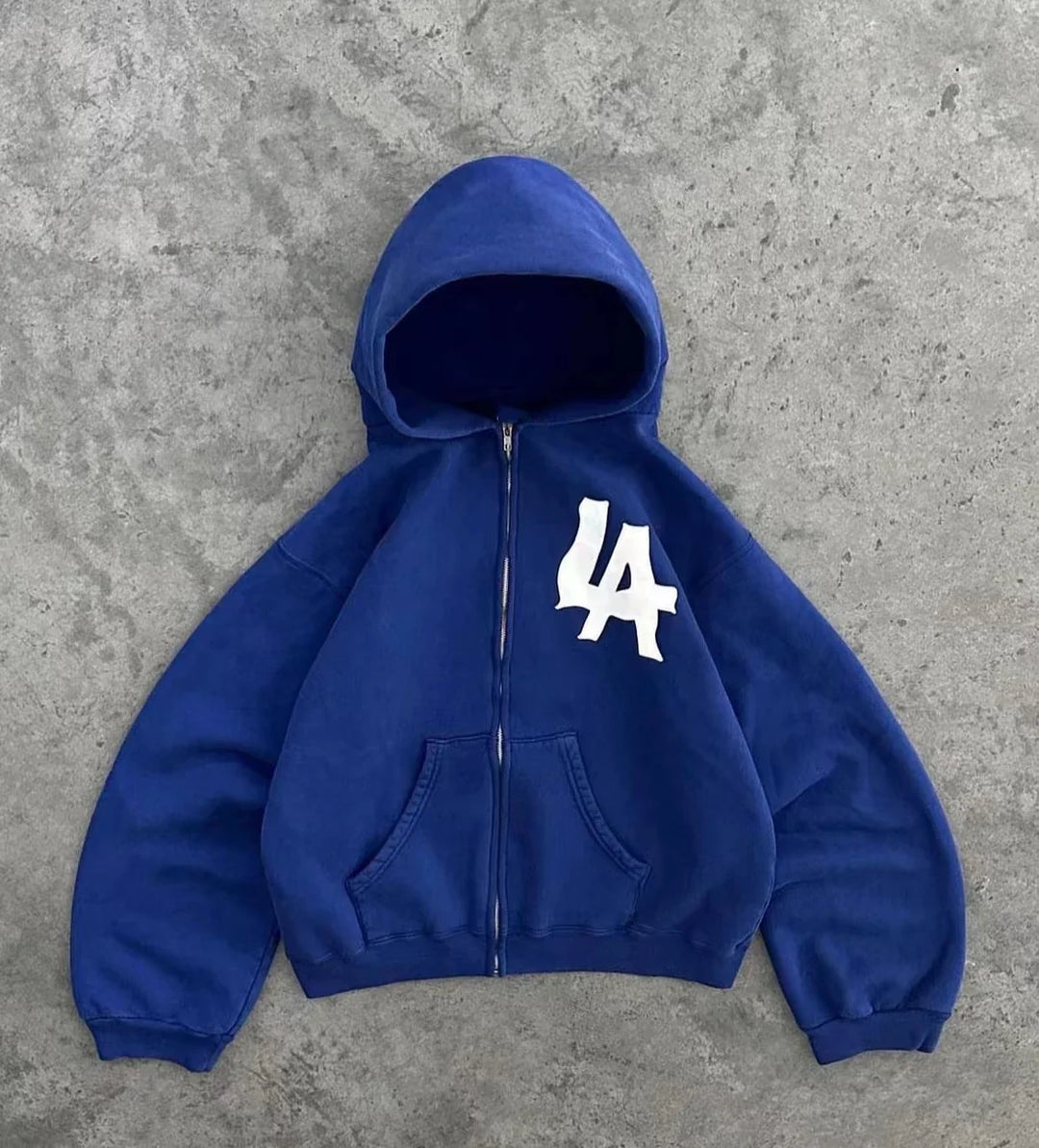 Modern unisex hoodievest, uitermate geschikt voor expressieve outfits met een comfortabele losse pasvorm.