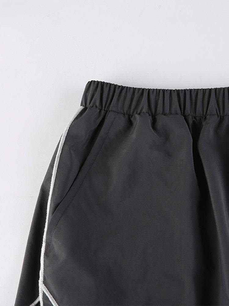 Zwarte dames baggy broek, trendy streetwear met een focus op comfort en stijl.