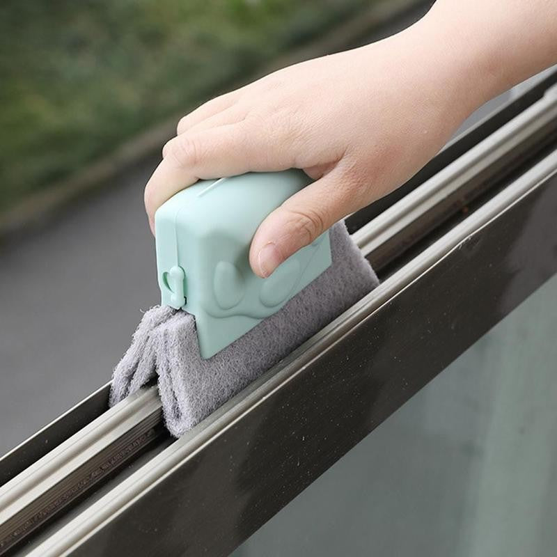 Compacte kierenreiniger met stevige borstelharen, ideaal voor het schoonmaken van raamkozijnen.