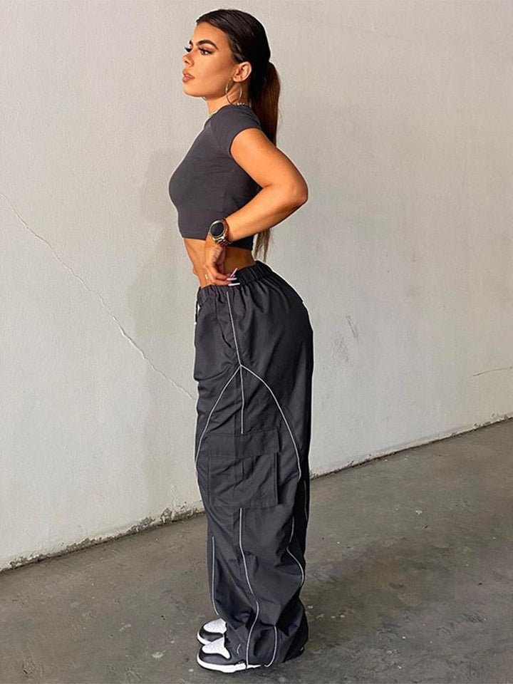 Zwarte dames baggy broek streetwear, veelzijdig en trendy voor elke gelegenheid.