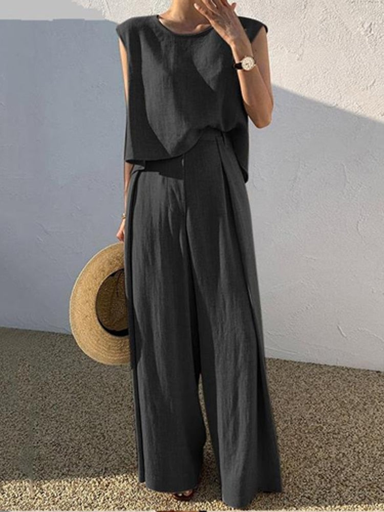 Dit 2-delige dames pak combineert casual comfort met elegante stijl voor lente en zomerse dagen.