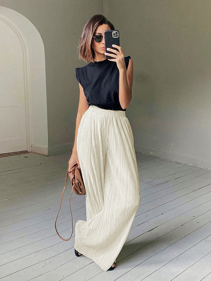 Veelzijdig Evita dames ensemble: casual of zakelijk, deze chique outfitset van blouse en broek is perfect.