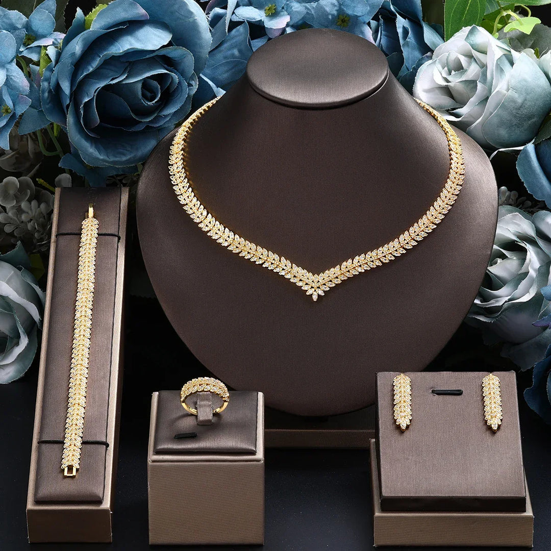 Luxe 4-delige bruidssieradenset voor dames met sprankelende zirkonia: ketting, oorbellen, armband, ring.