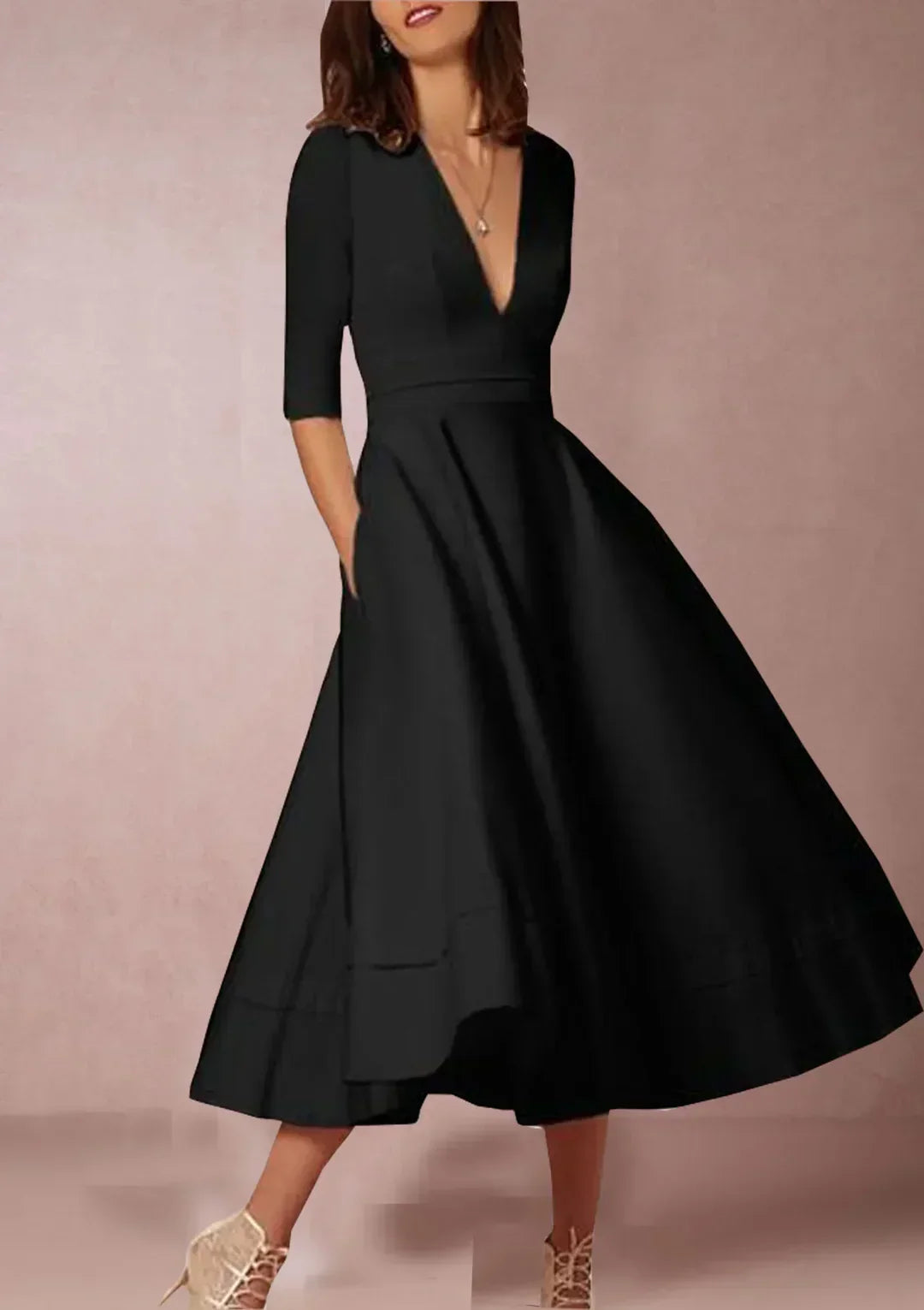 Comfortabele A-lijn midi jurk van katoenmix met V-hals, driekwartmouw en elegante volumineuze rok. Dames mode.