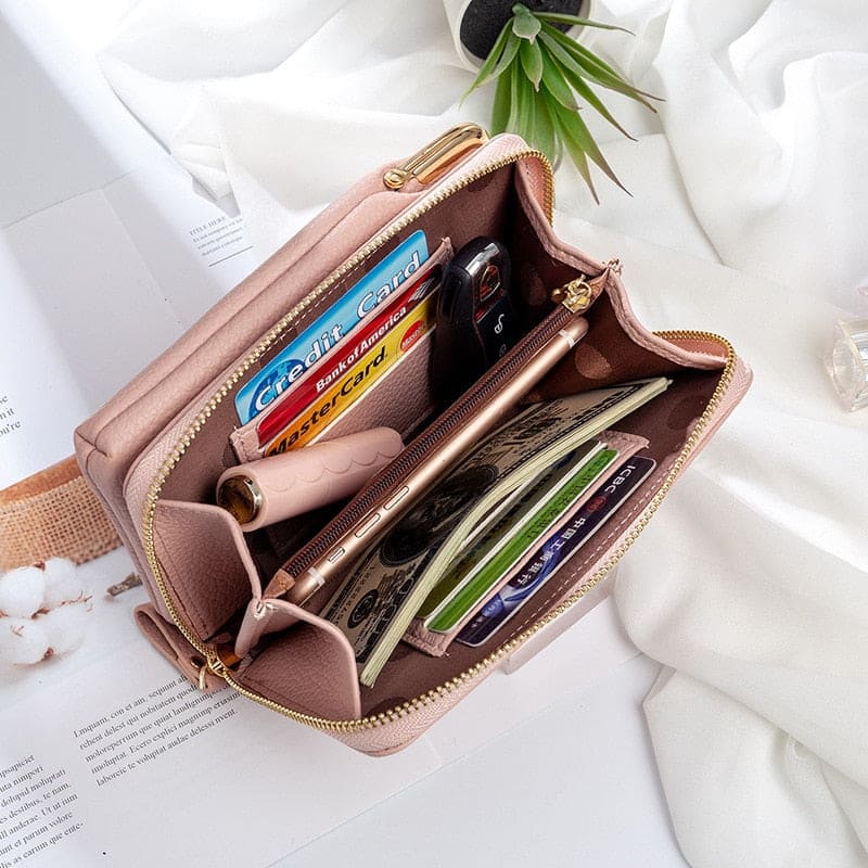 Praktisch crossbody telefoontasje; handenvrij en stijlvol voor onderweg. Ideaal voor dames.