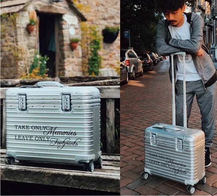 Duurzame aluminium reiskoffer met TSA slot. Zilveren hardcase koffer voor veilige en luxe reisbagage. Perfecte spinner.