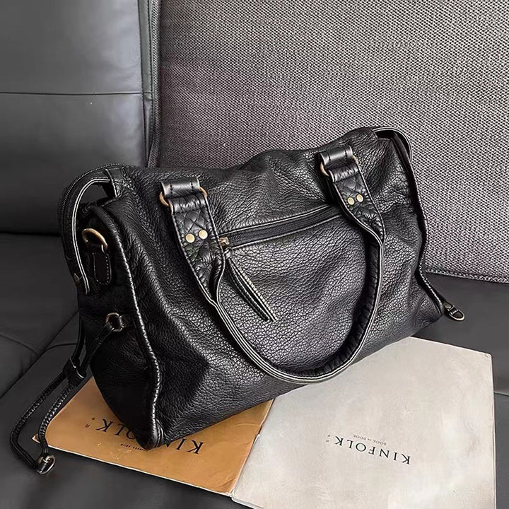 Modieuze zwarte dames tas, elegante retro handtas en schoudertas, voegt stijl toe aan elke outfit.