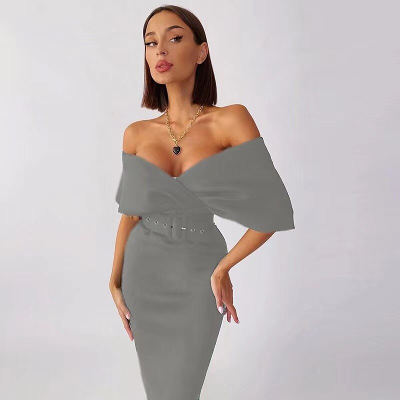 Zachte, comfortabele grijze damesjurk. Een elegante midi jurk die perfect is voor feesten en speciale gelegenheden.