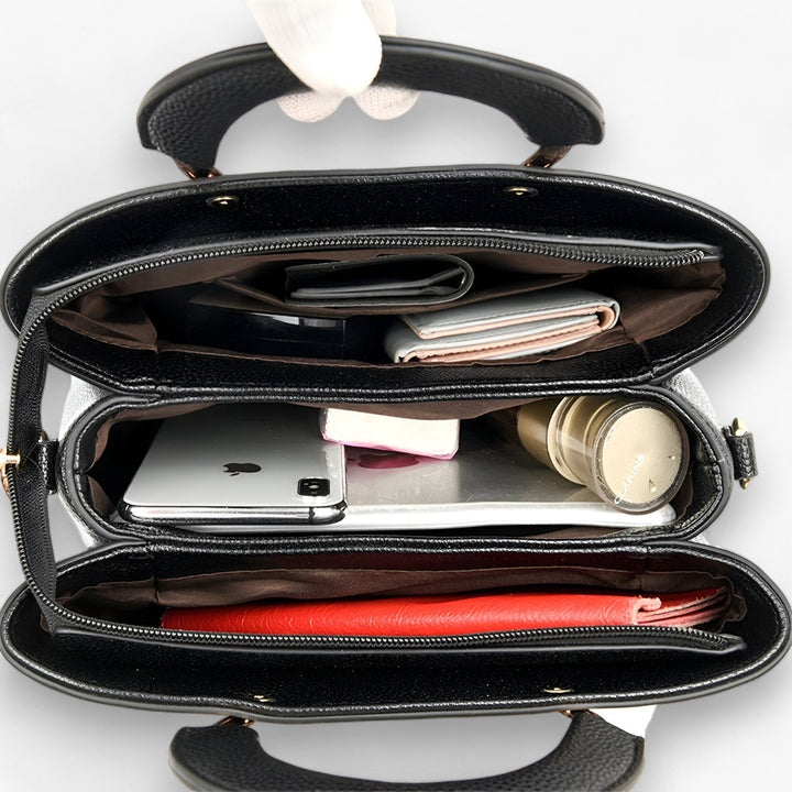 Elegante leren handtas voor dames, veelzijdig en stijlvol, voor elke gelegenheid geschikt.