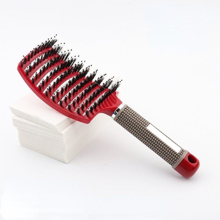 Gezonde haarverzorging met deze anti-statische ontklittende borstel voor glad resultaat.