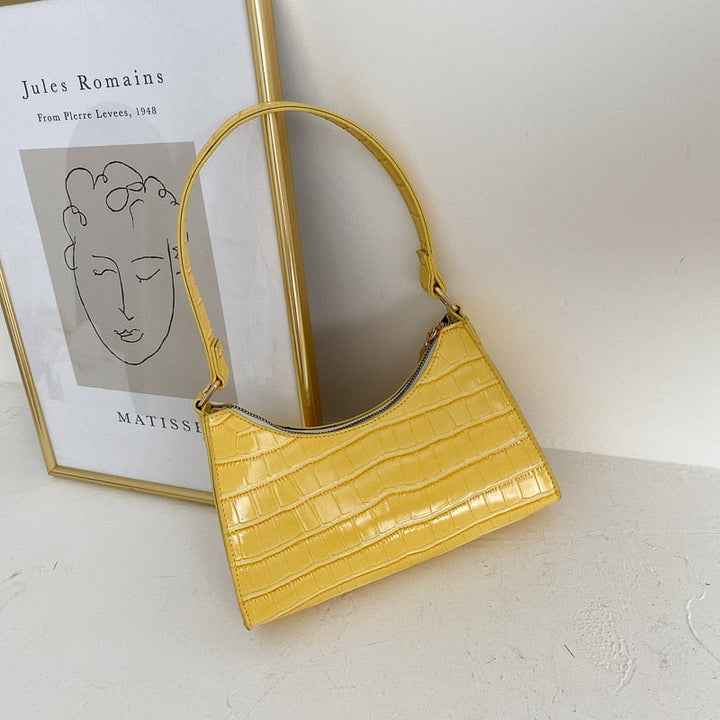Modieuze handtas dames, met een speelse dierenprint en gestructureerd design.