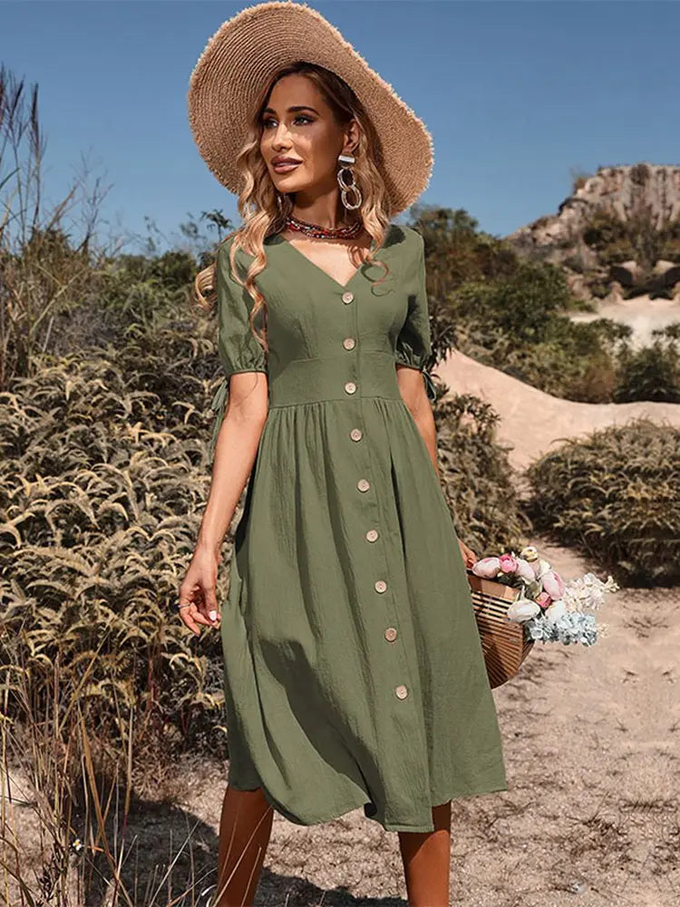 Zwarte elegante V-hals jurk voor dames, een comfortabele en modieuze keuze voor elke gelegenheid.