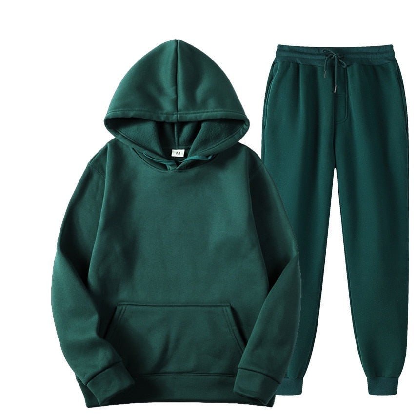Mannen kledingset: moderne jogger en hoodie, ideaal voor een relaxte casual stijl.