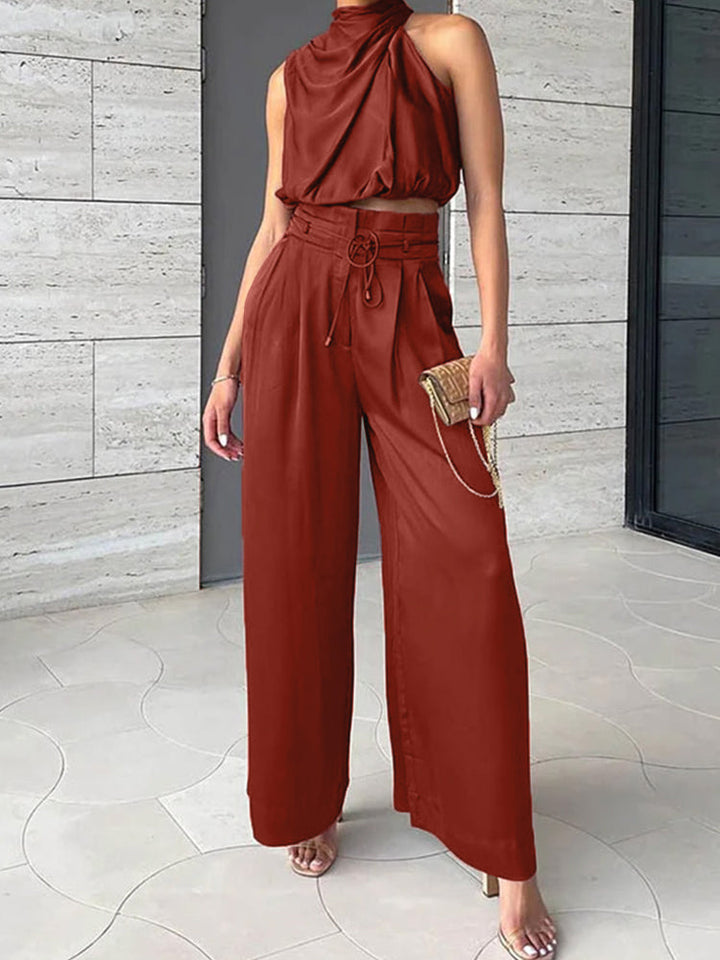 Elegante dames top en broek set, een chique tweedelige outfit voor dames. Geschikt als comfortabele zomerkleding of feestoutfit.