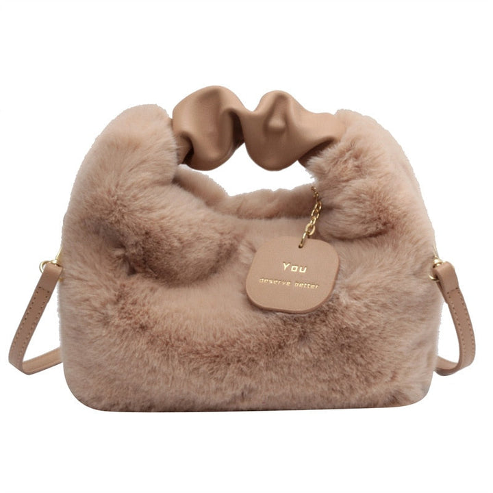 Modieuze fluffy damestas, perfect als schoudertas of crossbody tas.