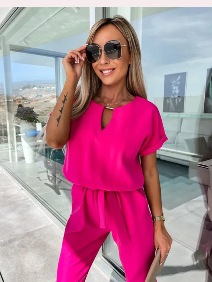 Zwarte Dames Patty jumpsuit, veelzijdig met V-hals en korte mouwen, comfortabele lente en zomer kleding.