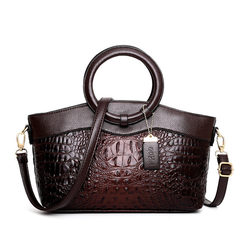 Zwarte vintage leren tas voor dames. Elegante handtas met verstelbare schouderband, luxe design, perfect als crossbody.