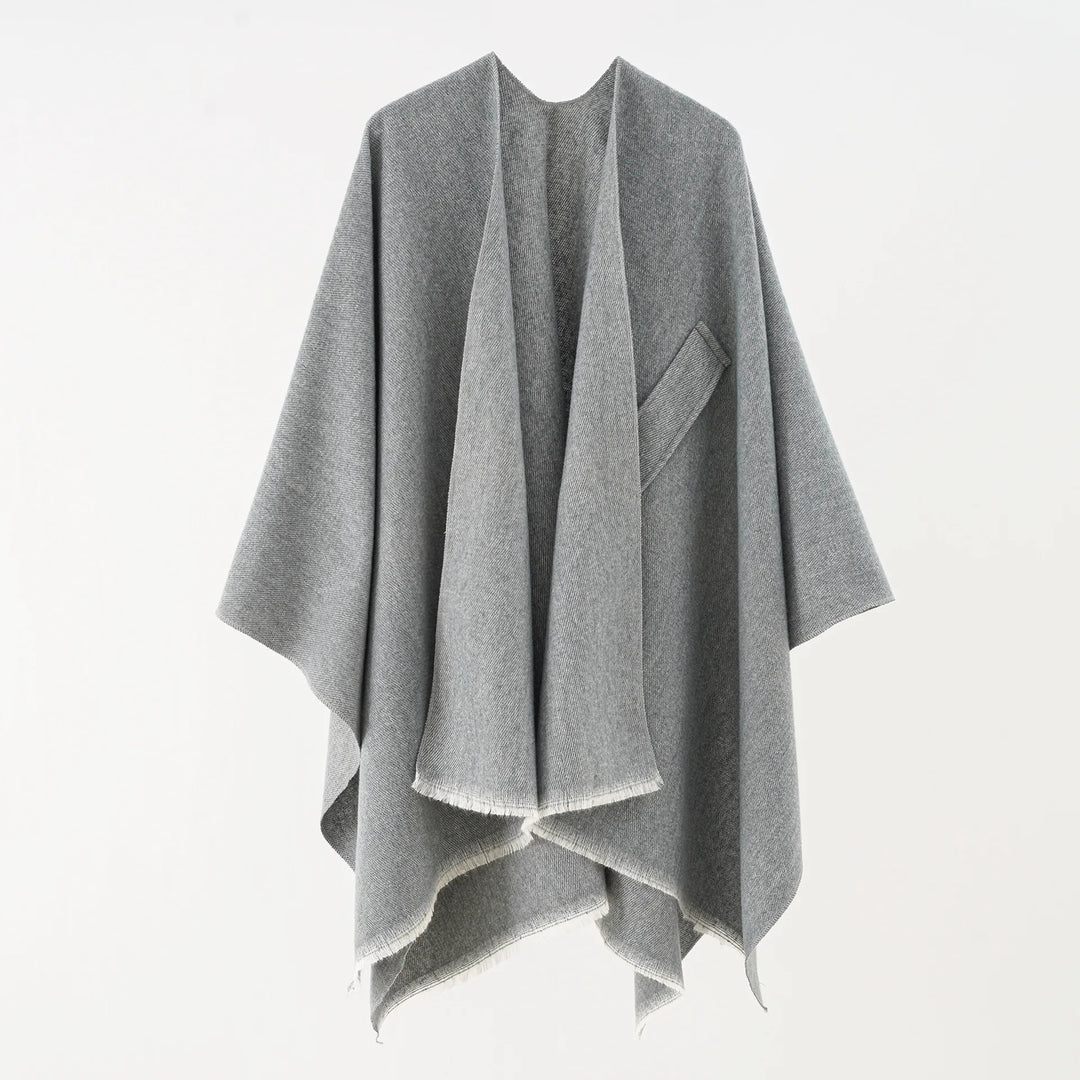 Veelzijdige damesponcho, zacht kasjmier look, retro chic en one size comfort.