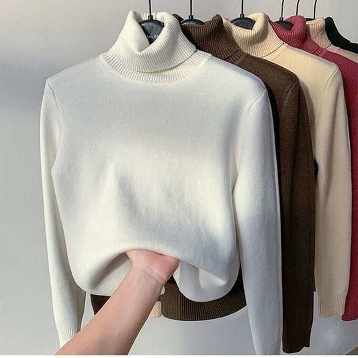 Grijze comfortabele dames wintertrui, gevoerd en modieus, perfect voor koude winterdagen.