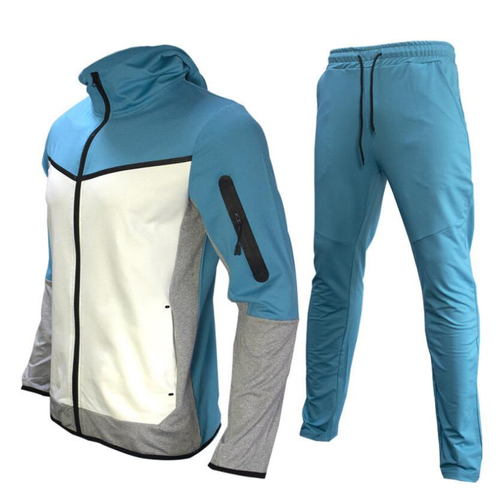 Man draagt stijlvol Taavi heren trainingspak tijdens fitness, perfecte sportkleding voor hardlopen en actieve training.