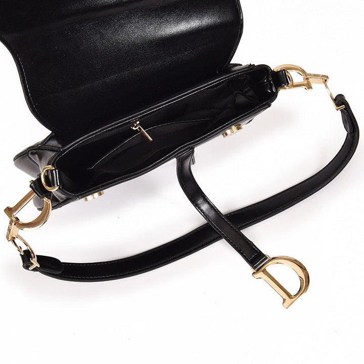 Luxe dames tas SANDSBERGORIGINALS: een tijdloze zadeltas en elegante schoudertas.
