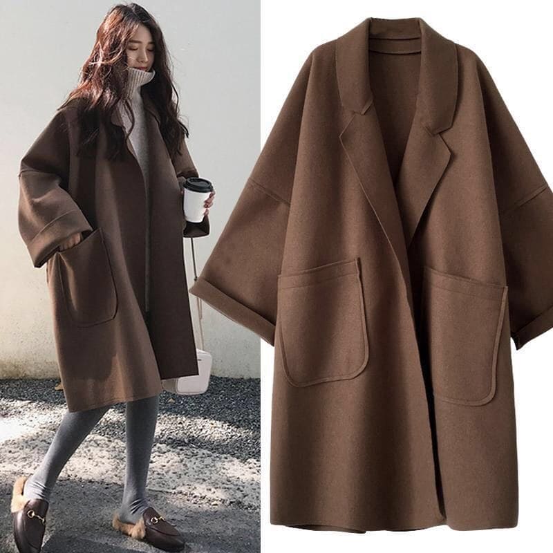 Elegante oversized dames trenchcoat van wolblend, perfect voor herfst en lente, met klassieke stijl.