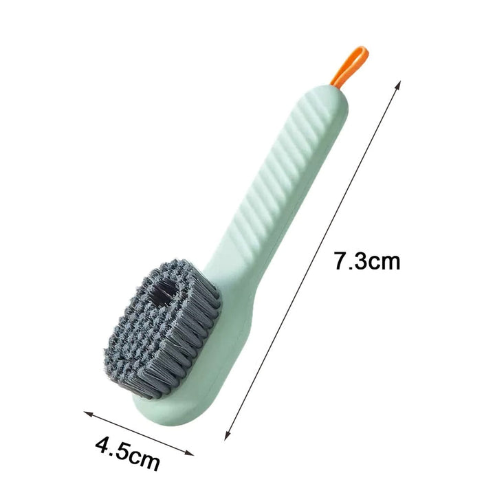 Compacte schoenborstel met zeepdispenser, speciaal ontworpen voor grondige en moeiteloze schoenenreiniging.
