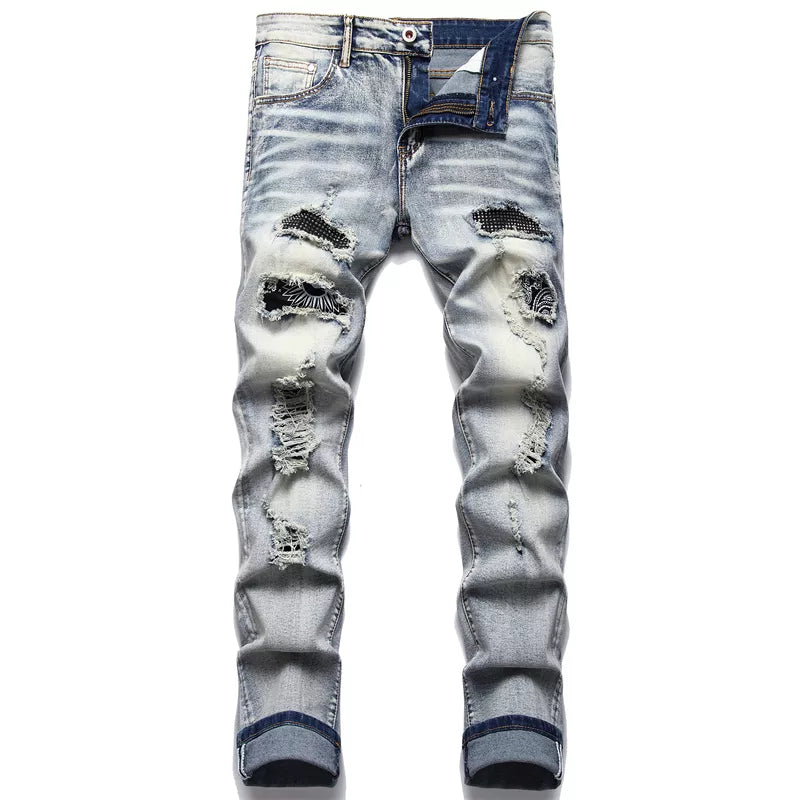 Stijlvolle Jaxon herenjeans met trendy scheuren, ideaal voor een relaxte maar modieuze outfit. Casual en comfortabel.