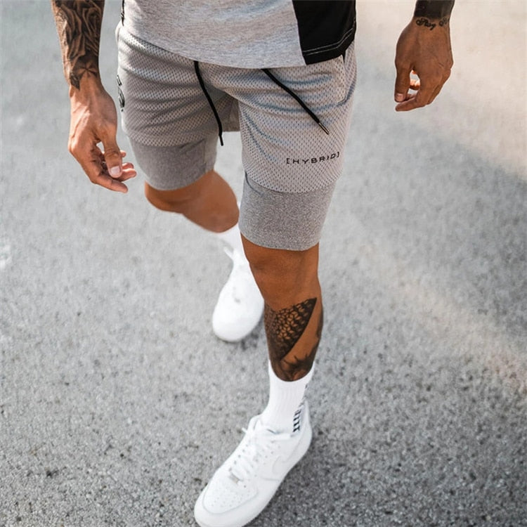 Complete heren sportoutfit met 2-in-1 compressie shorts; klaar voor actie.