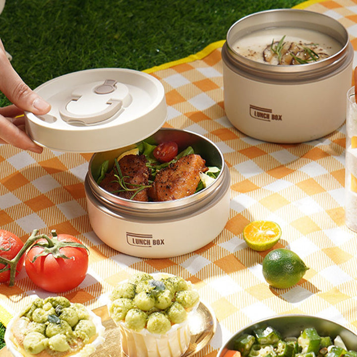 Efficiënte RVS isolatie lunchbox set. Houdt je maaltijden langdurig warm. Herbruikbaar en lekvrij.