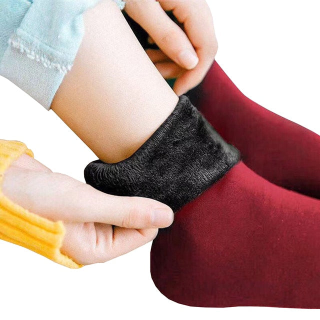 Pluche gevoerde unisex thermosokken, naadloos design voor ultieme warmte en comfort in winterkleding.