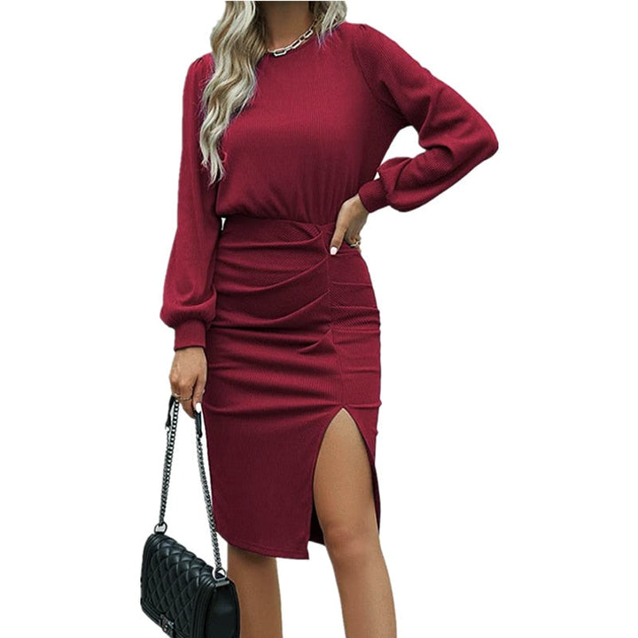 Figuuraccentuerende dames bodycon jurk, geribd en gebreid, met lange mouwen en split. Voor een elegante look.