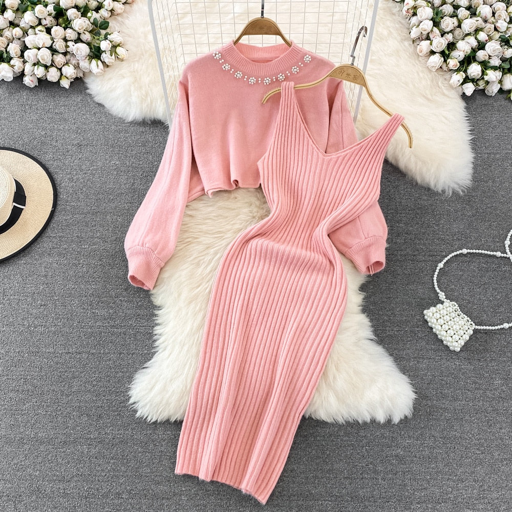 Zwarte elegante 2-delige dames comfy set met stijlvolle trui en jurk.