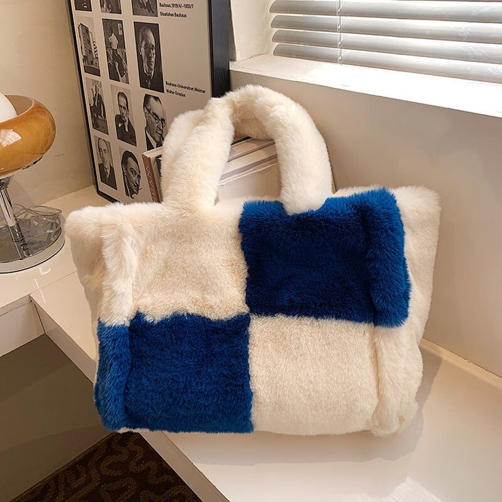 Warme Pipa pluche dames handtas; een trendy en zacht accessoire, ideaal voor de winter.