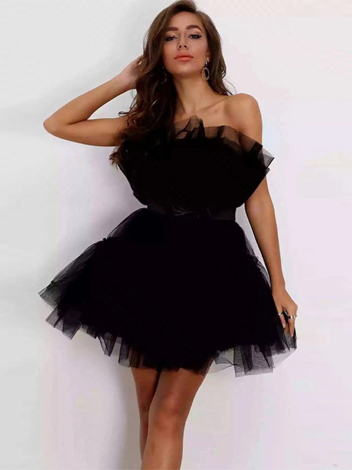 Roze strapless feestjurk voor dames, elegant & flatterend design, perfect voor zomerfeesten.