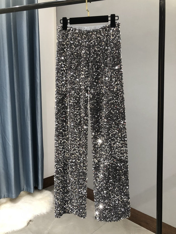 Modieuze dames glitterbroek met elegante wijde pijpen, essentieel voor je feestgarderobe en speciale gelegenheden.