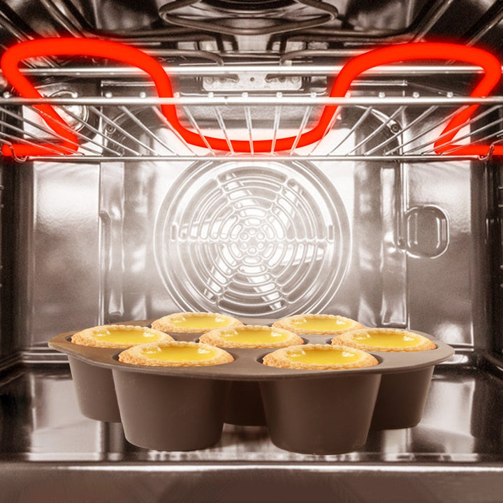 Praktisch bakgerei: siliconen cupcakevorm in een moderne keuken. Klaar voor gebruik in airfryer of oven.