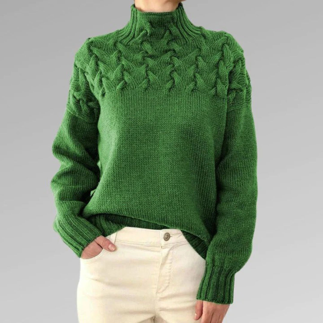 Lange pasvorm gebreide damestrui met col. Stijlvolle winter essential die warmte biedt.