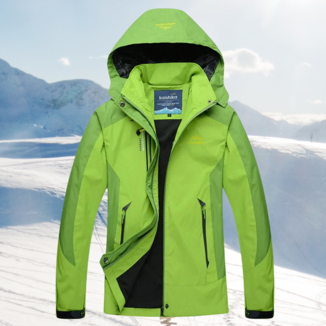Lichtgewicht groene dames outdoorjas voor wandelen, wind- en waterdicht. Comfortabel & functioneel.