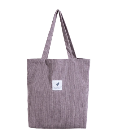 Grote corduroy tote bag, comfortabel en multifunctioneel voor de moderne vrouw.