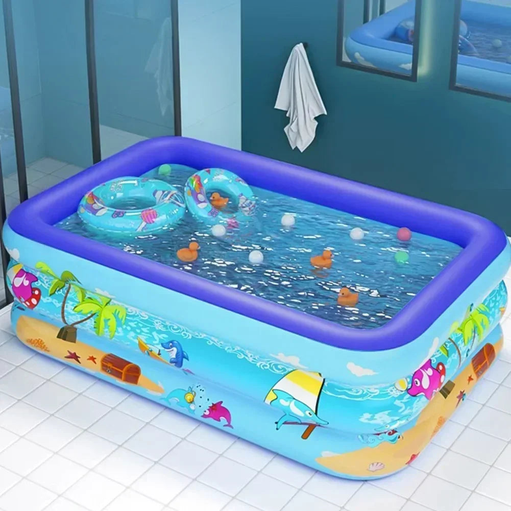 Opblaasbaar kinderzwembad met vrolijk cartoon design, perfect voor zomerse waterpret in de tuin of op balkon.
