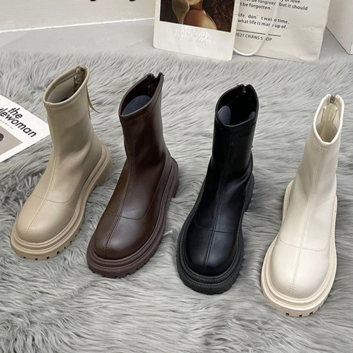 Dames Xina plateau enkellaarsjes: trendy & comfortabel, met stevige plateauzool en ronde neus.