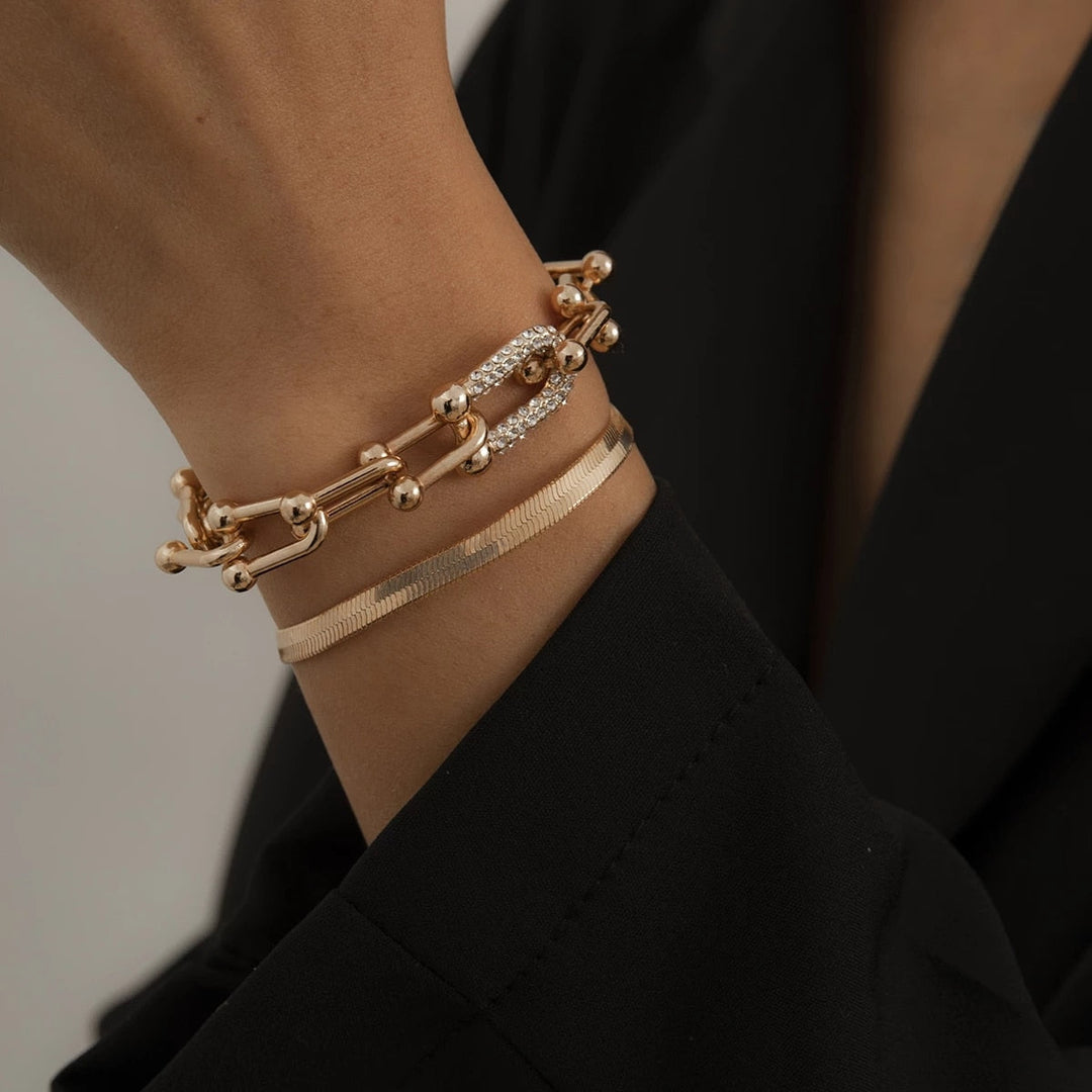 Elegante dames armbandenset, 2-delig, in goudkleurig design, perfect voor elke outfit.