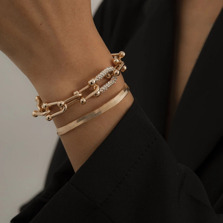 Elegante dames armbandenset, 2-delig, in goudkleurig design, perfect voor elke outfit.