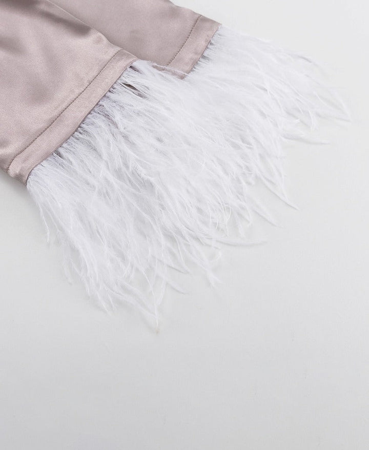 Elegant dames loungepak met veren en een losse pasvorm, voor ultiem comfort.