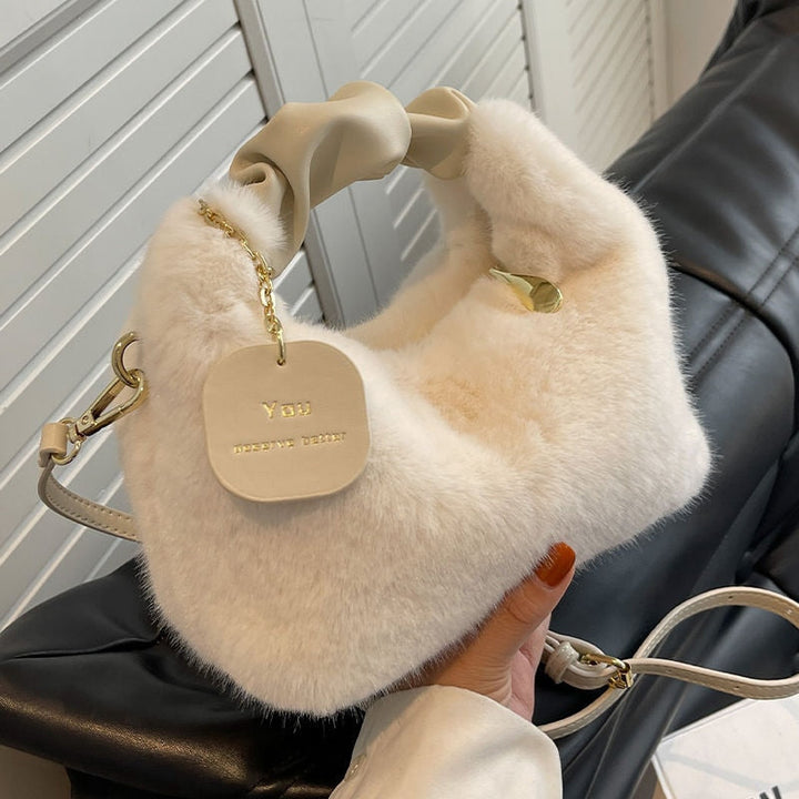 Stijlvolle fluffy tas voor dames, veelzijdig en trendy accessoire.
