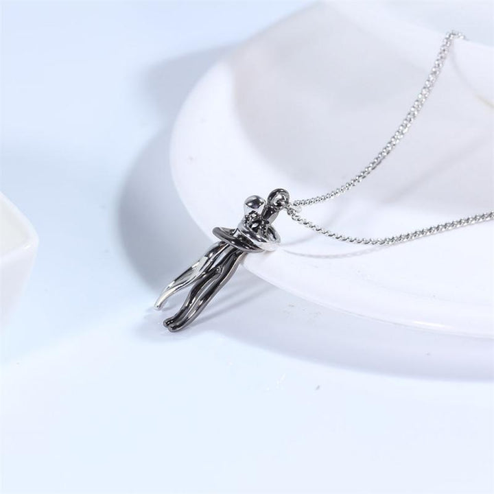 Zilveren Omhelzing ketting, unisex sieraad dat verbondenheid en liefde symboliseert, ideaal cadeau.
